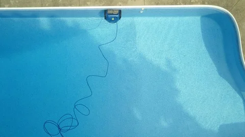 Footage of a pristine backyard swimming pool in a luxury suburban home. Stock-Footage 90459997