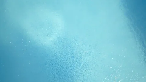 Footage of a pristine backyard swimming pool in a luxury suburban home. Stock-Footage 90460082