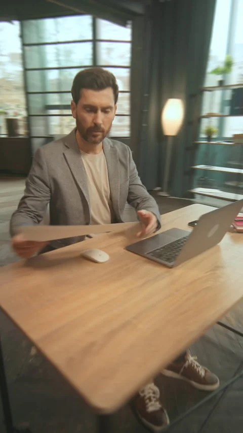 Footage of programmer working on laptop in modern cozy office. Young Caucasian Stock-Footage 278303905