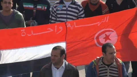 Footage of protesters demonstrating in central Cairo during the January 25 Revol Stock Footage 114848439