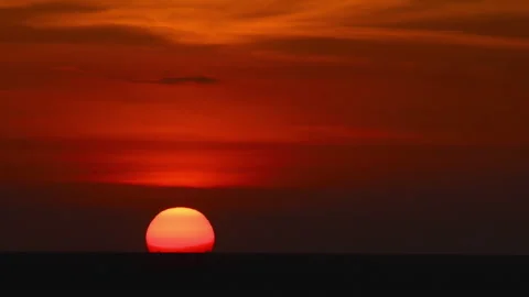 Footage of the red sun at sunset Stock Footage 323006498