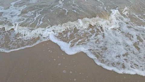 Footage Relaxing Beach Waves and Foamy Water on the Shore  Video stock 317460480