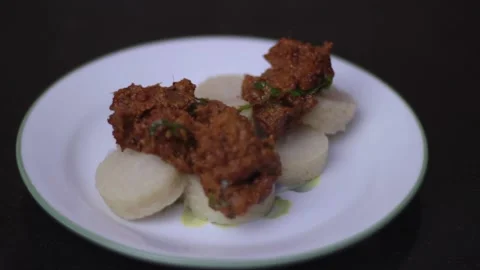 A footage serving Beef Rendang and Lemang a malay cuisine that served during Stock Footage 131363742