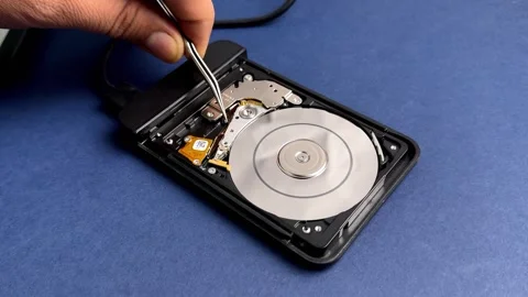 Footage show inside of the hard disk driver with crashed head Stock Footage 284290480