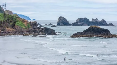 Footage shows Haystack Rock, a 235-foot basalt sea stack located on Cannon Beach Stock Footage 309313666