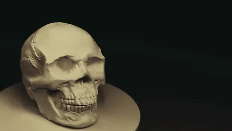 Footage of skull dark background Stock Footage 207152526