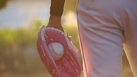 Footage Slow Motion: Baseball Player Tossing Ball into Glove Stock Footage 146460825