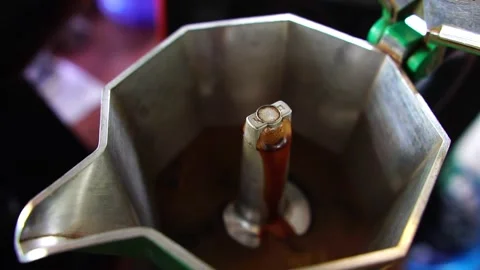 Footage Slow Motion: Boiling coffee in a moka pot Stock Footage 197800706