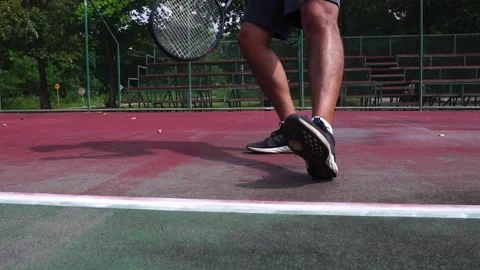 Footage Slow Motion: Man bouncing ball before serving on tennis court Stock-Footage 206993986