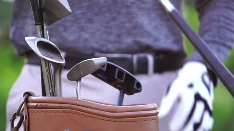 Footage Slow Motion: Man pulling club from golf bag Stock Footage 161893450