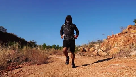 Footage Slow Motion: Man runner training in the mountains Stock Footage 146324005