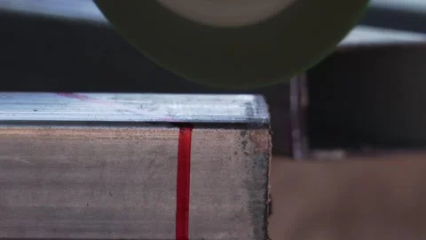 Footage Slow Motion: Man worker grinding iron with electric saw while working Stock Footage 133706594