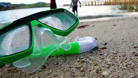 Footage Slow Motion: Mask for diving sports placed on the beach, safety equipmen Stock Footage 204742248