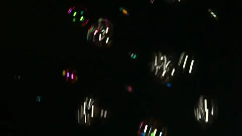 Footage of soap bubbles dark background Stock Footage 245555490