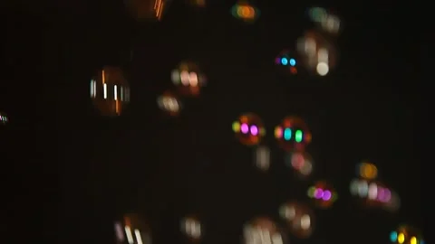 Footage of soap bubbles dark background Stock Footage 246483650