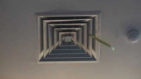 Footage of Square ceiling AC diffuser vent on a white wall Video stock 338046149