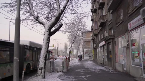 Footage of streets and traffic in Sofia city during winter, rows of shops Stock Footage 170887470