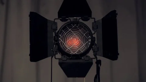 Footage of studio light being turned on and off. Floodlight flashes Video stock 74306900