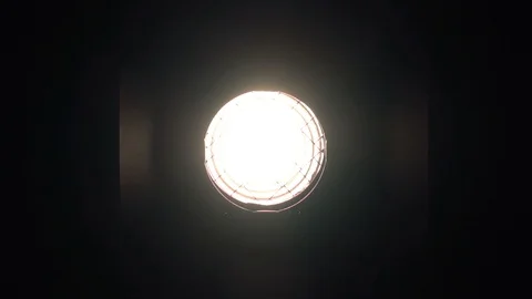 Footage of studio light being turned on and off. Floodlight flashes Stock-Footage 99239179