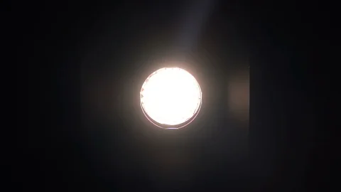 Footage of studio light being turned on and off. Floodlight flashes Stock-Footage 99288592