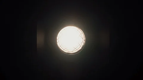 Footage of studio light being turned on and off. Floodlight flashes Stock-Footage 99290096