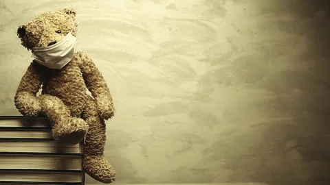 Footage of toy bear book sharp wall Stock Footage 129256441