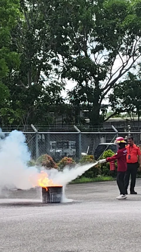 Footage of training on the use of fire extinguishers at Minangkabau Airport Stock Footage 330513502