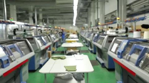 Footage with variable focus of working knitting machine in workshop. Stock Footage 258662427