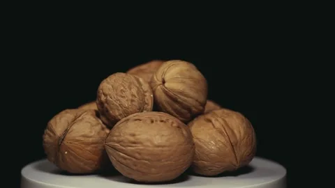 Footage of walnut dark background Video stock 188527858