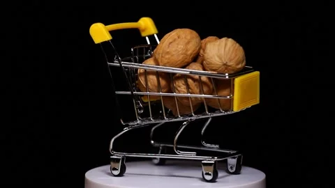 Footage of walnut trolley dark background Stock Footage 188532833