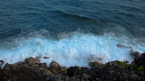 Footage - Waves Splash the Coastline Stock Footage 72754563