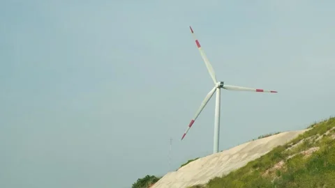 Footage of windmill. Wind power turbine for clean, renewable energy. Sustai.. Stock Footage 268010796