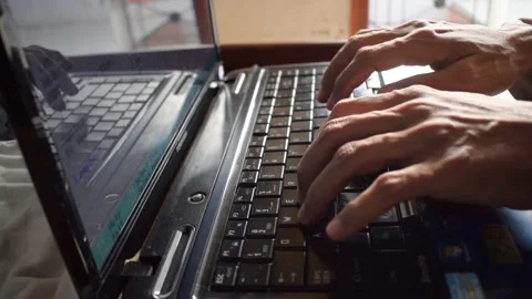 Footage works in an office with a computer or laptop 6 Stock Footage 149378787