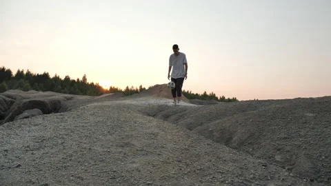 Football freestyler performs complex tricks with the ball in nature Stock Footage 133569872