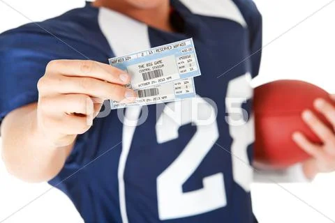 Football: holding game day tickets Stock Photos