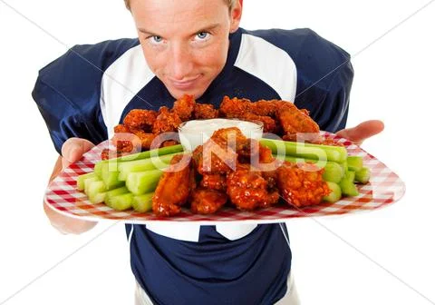 Football: hungry for buffalo wings Stock Photos