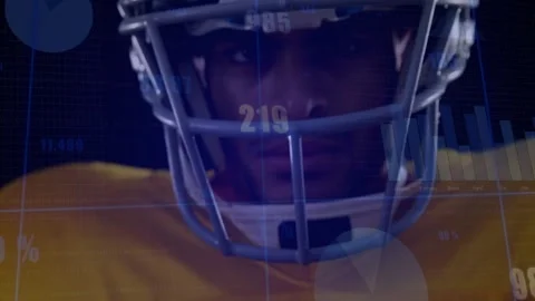 Football player adjusting grip causing data graphs and pie charts cycling for Stock Footage 330664787