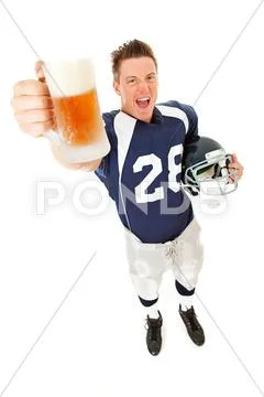 Football: player excited for beer Stock Photos