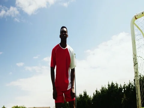 Football player heading the ball Stock Footage