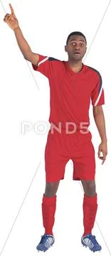 Football player in red raising his hand Stock Photos