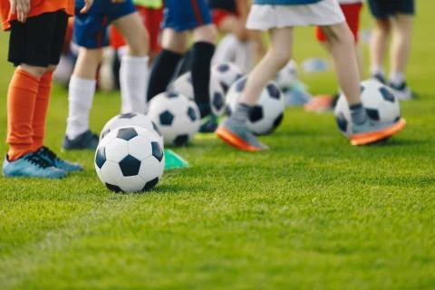 Football practice for youth. Children soccer training background Stock Photos