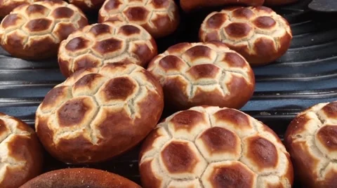 Football shaped bread rolls Stock Footage 64583143