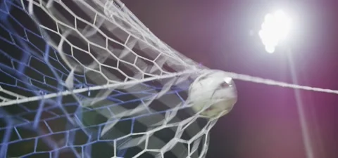 Football (soccer) ball goes into gates, goal. Slow motion 120fps Stock Footage