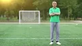 Football trainer stands on the football field HD Footage