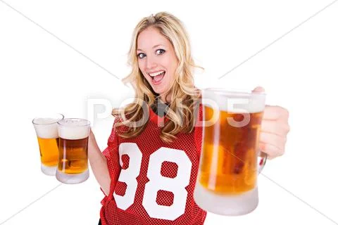 Football: woman holding up beer Stock Photos