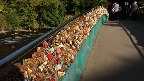 Footbridge covered in lovelocks Stock Footage 143380856