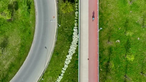 Footbridge with cycle path and biker in Krakow, Poland Video stock 273038894