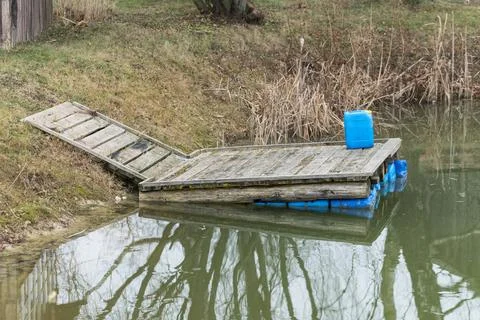 The footbridge is not functioning normally due to low water levels. Stock Photos