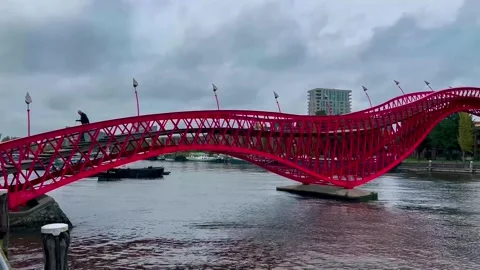 Footbridge Python Bridge Eastern Docklands Amsterdam Netherlands Video stock 274354388