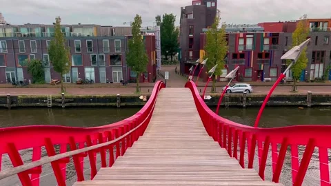 Footbridge Python Bridge Eastern Docklands Amsterdam Netherlands Video stock 274354454